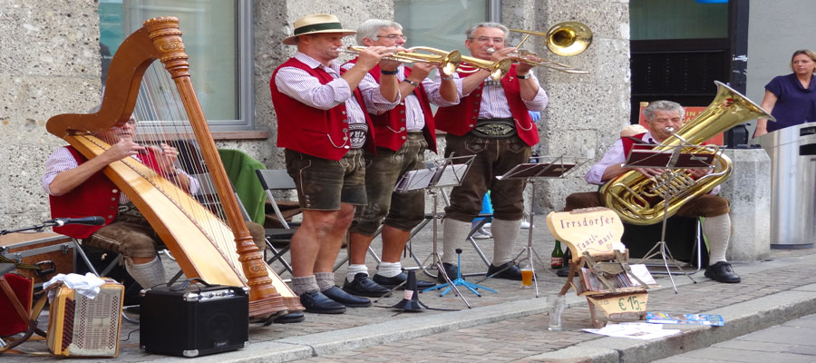 Strains of traditional folk music fill the heady Salzburg air